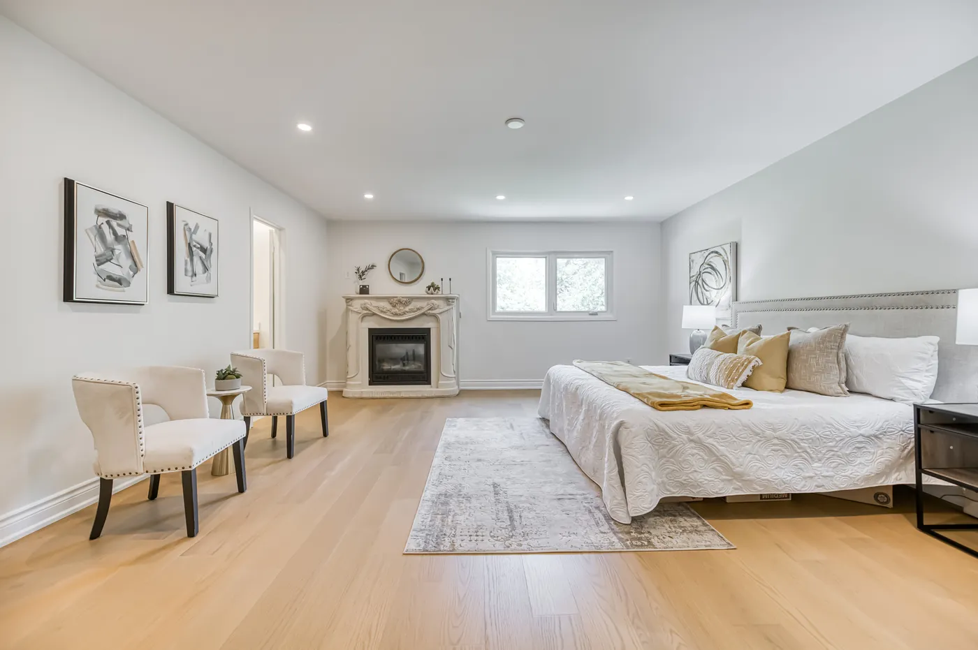 The primary bedroom with a fireplace.